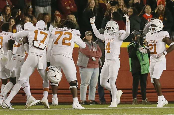 Texas Longhorns special team member Austin Jordan (4) celebrates after blocking a field goal and running back for a two-point score against Iowa State during the third quarter in the Big-12 football showdown at Jack Trice Stadium on Saturday, Nov. 18, 2023, in Ames, Iowa.